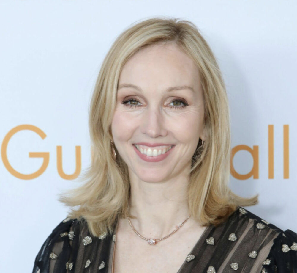 A headshot of Andrea Grover.