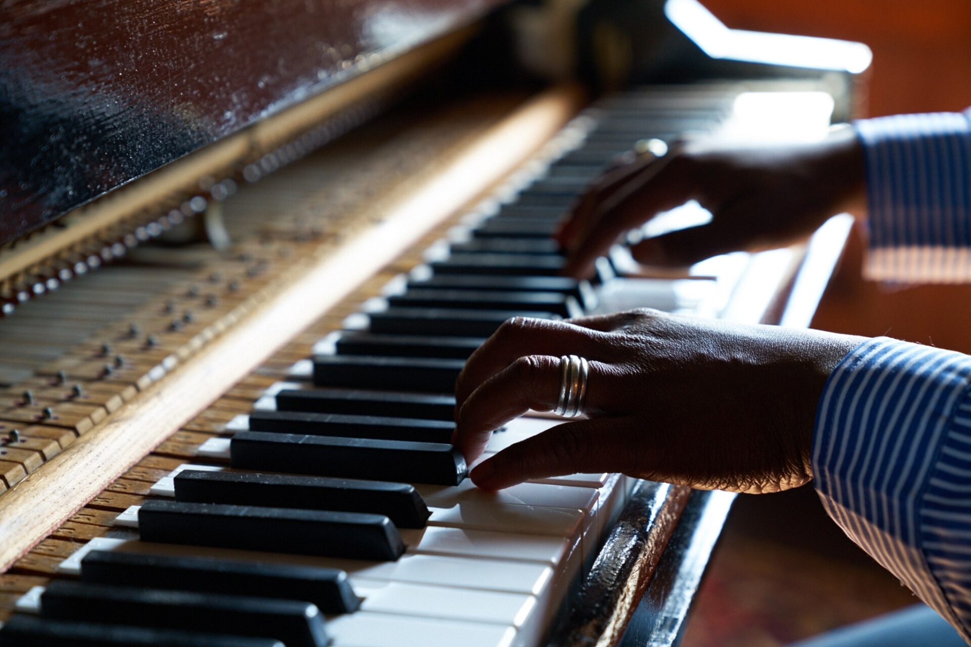 A man playing a piano.