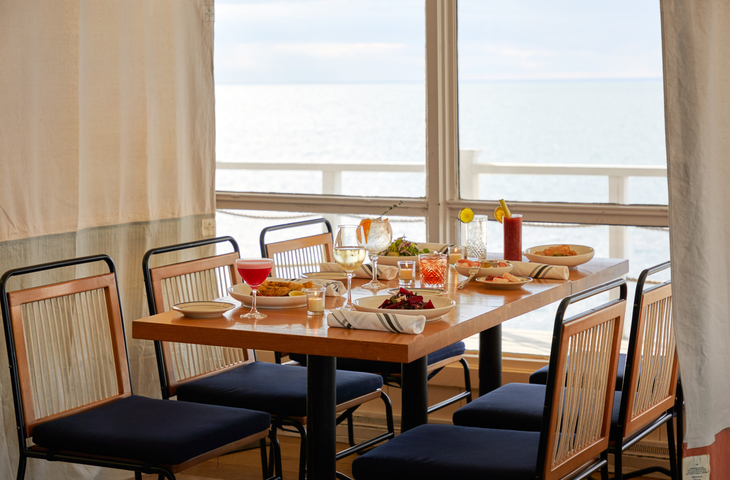 Halyard dining table set with private curtains