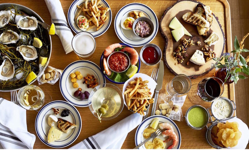 An assortment of shared plates and appetizers from The Halyard.