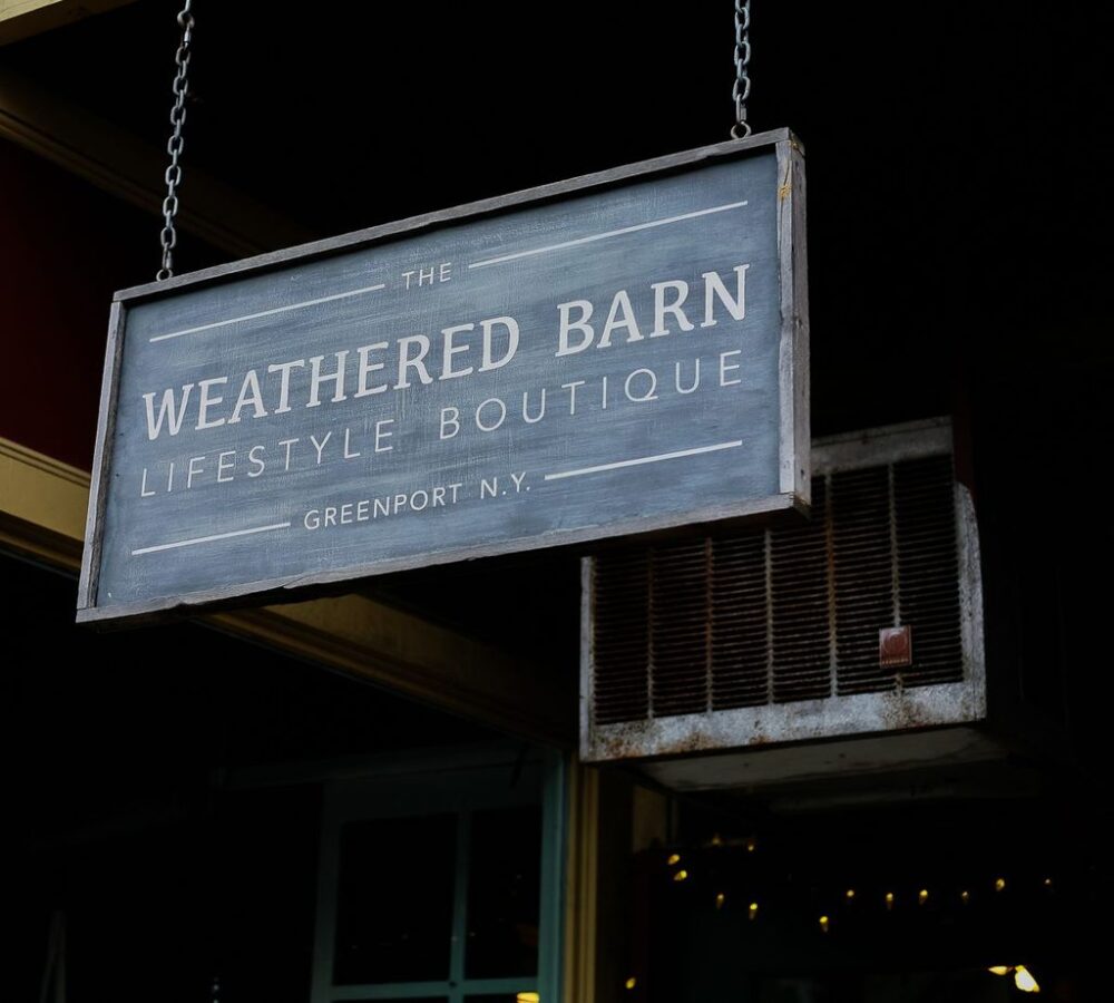A sign of the Weathered Barn in Greenport, NY.