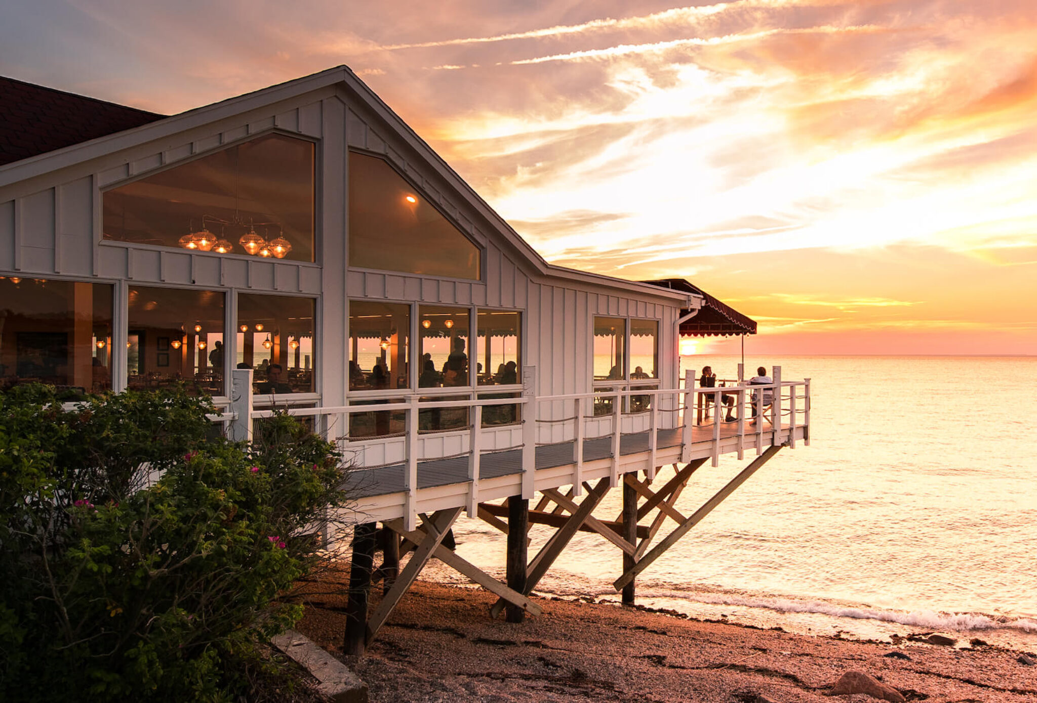 The wraparound deck at Sound View Greenport at sunset.
