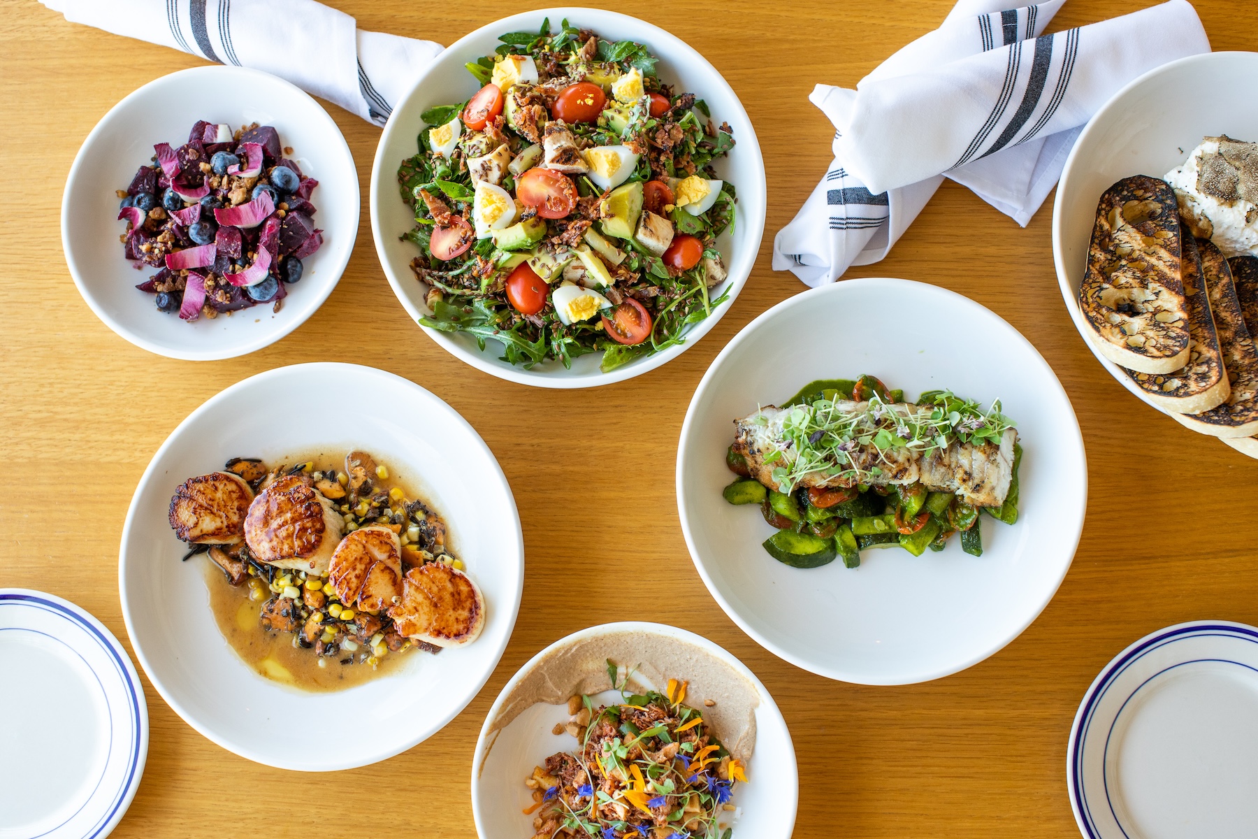 Assorted shared plates and appetizers from The Halyard.