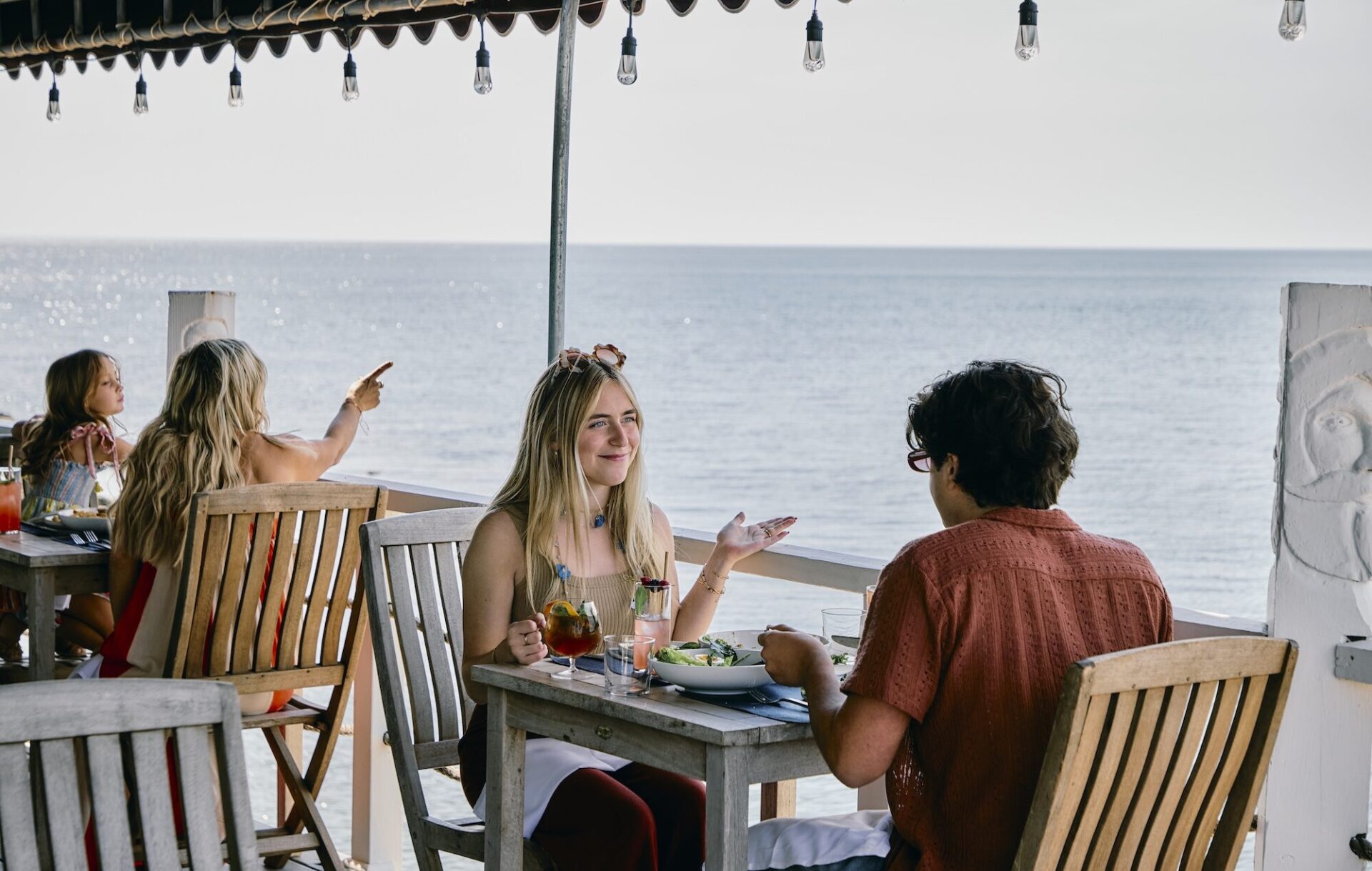 A bustling patio scene at The Halyard Restaurant.