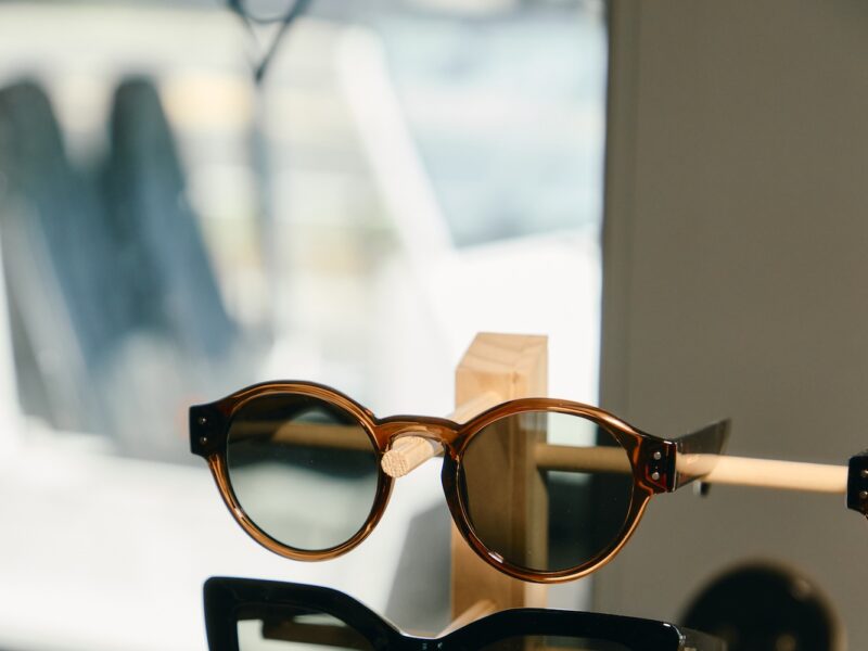 Sunglasses on a stand.